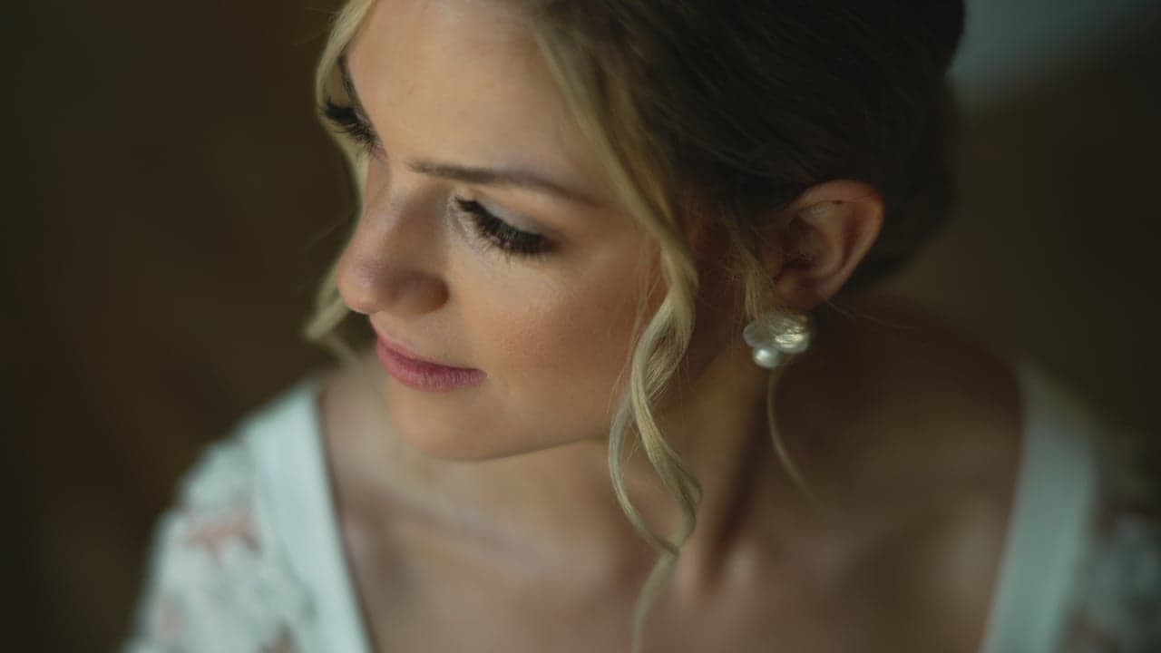 Still from Cassidy + Colton's wedding film