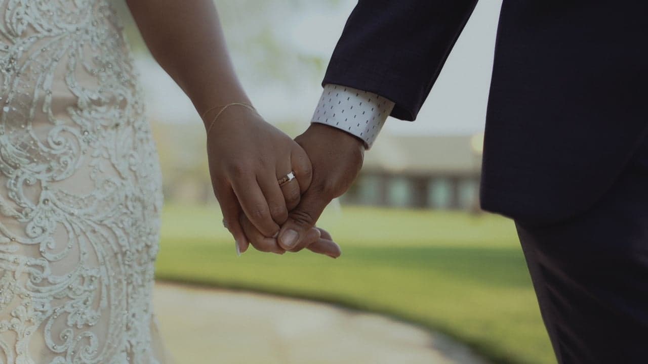 A candid moment from Lori and Ricky's wedding film